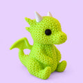 Dragão no estilo tricô - amigurumi com fundo lavanda