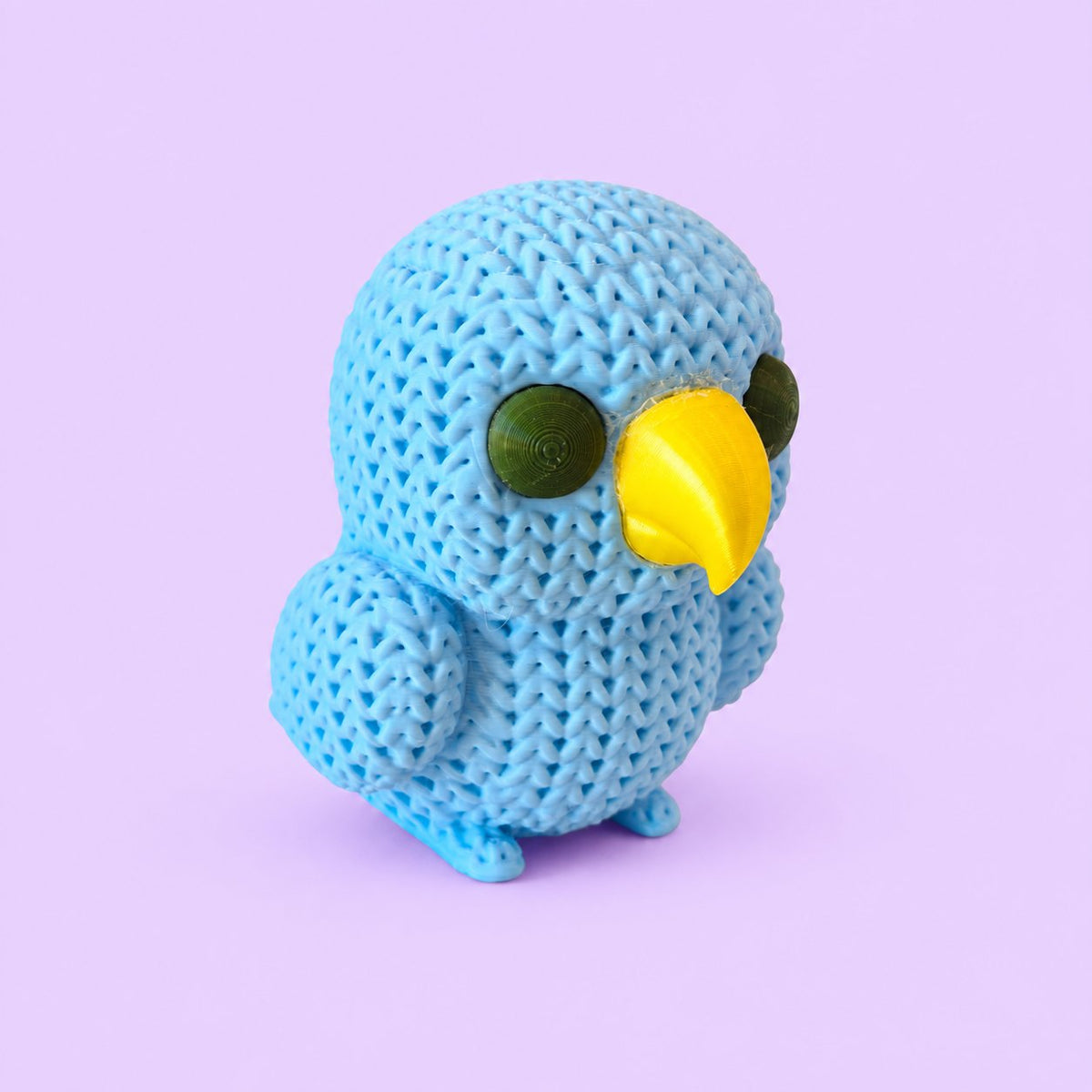 Papagaio no estilo tricô - amigurumi com fundo lavanda